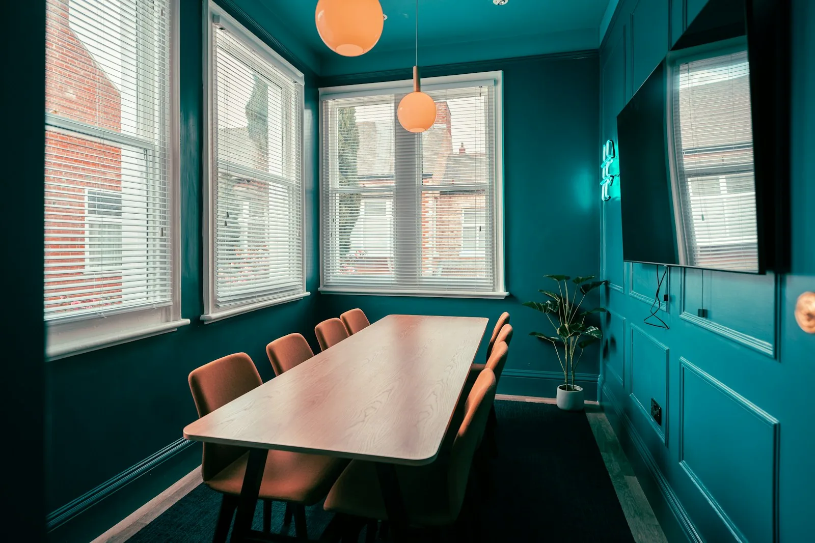 Minimalist law-firm reception with deep navy joinery
