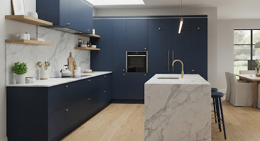 Minimalist kitchen detail with marble splashback and heritage gold