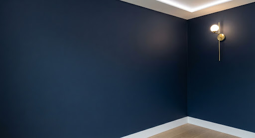 Rich navy matte painted wall detail