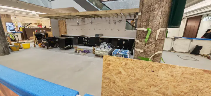 Wide progress view of counter runs and the raised timber frame