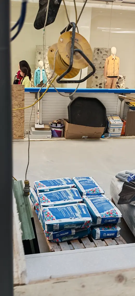 Floor finish and perimeter build-up during commercial kiosk works