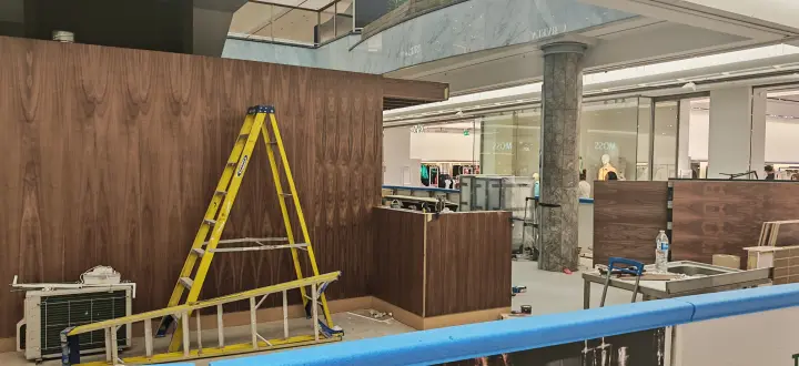 Later-stage counter and wall finishing works on the coffee kiosk